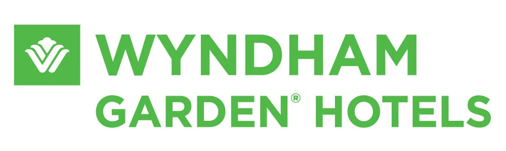 The Wyndham Garden Kenosha Harborside logo